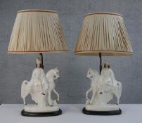 A pair of vintage Staffordshire pottery Scottish nobleman table lights with cream silk pleated