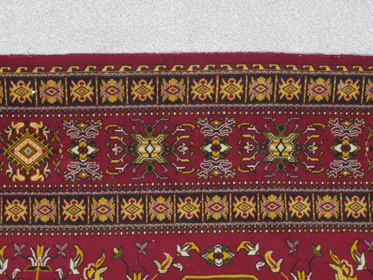 A red ground Heriz motif carpet. L.300 W.196cm - Image 3 of 5