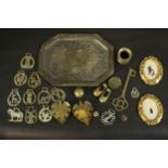 A collection of horse brasses, an Islamic design tray and other items along with a pair of gilded