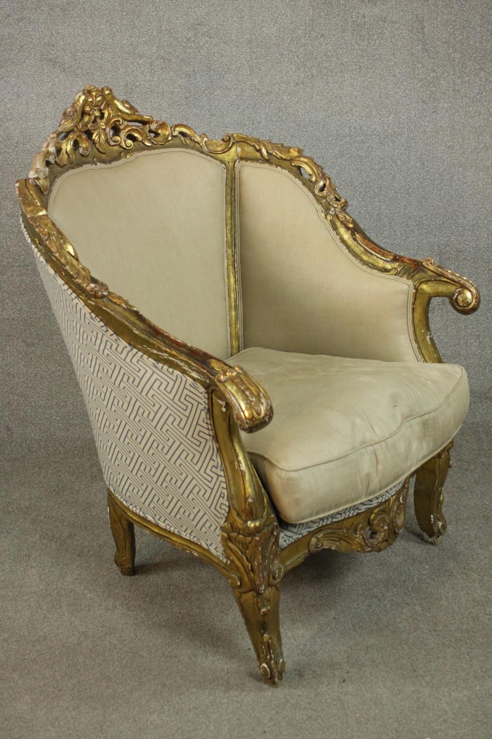 A pair of Louis XV style carved giltwood armchairs, 20th century, upholstered in beige fabric, - Image 3 of 10