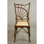 A Victorian Japanese inspired Aesthetic Movement bamboo side chair of unusual design, with a