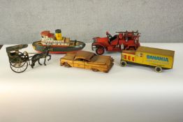 Five large vintage tin plate toys, including a steam boat, horse and carriage, fire engine, banana