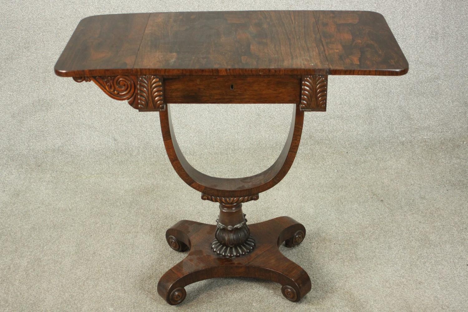 A William IV rosewood drop leaf work table, with a single drawer flanked by applied palm leaves, - Image 10 of 11