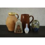 A collection of art pottery and ceramics, including a Royal Doulton Art Nouveau stone ware vase, a