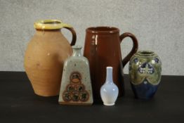 A collection of art pottery and ceramics, including a Royal Doulton Art Nouveau stone ware vase, a