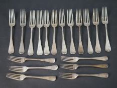A collection of six small and twelve large Victorian silver forks by John Aldwinckle & Thomas