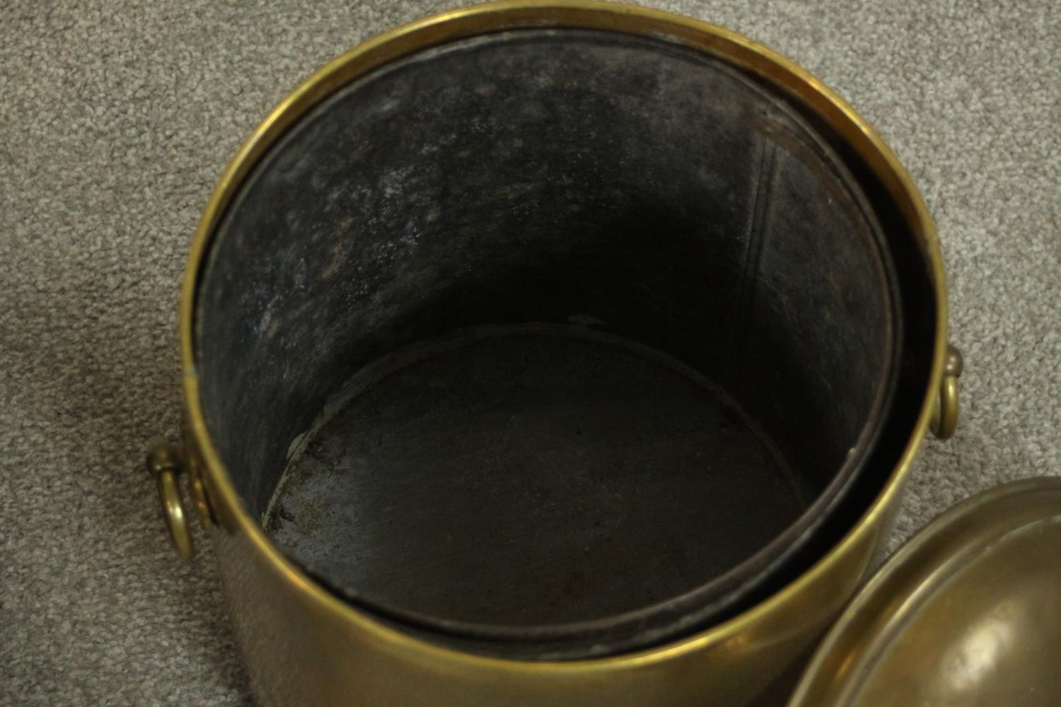A brass coal bucket and a copper coal bucket, both of cylindrical form with a lid and two handles. - Image 6 of 6