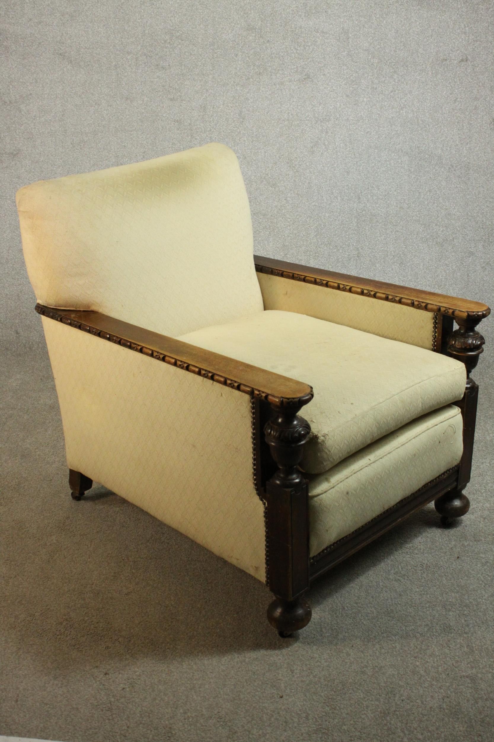 A pair of early 20th century oak armchairs, upholstered in cream fabric, with carved cup and cover - Image 5 of 10