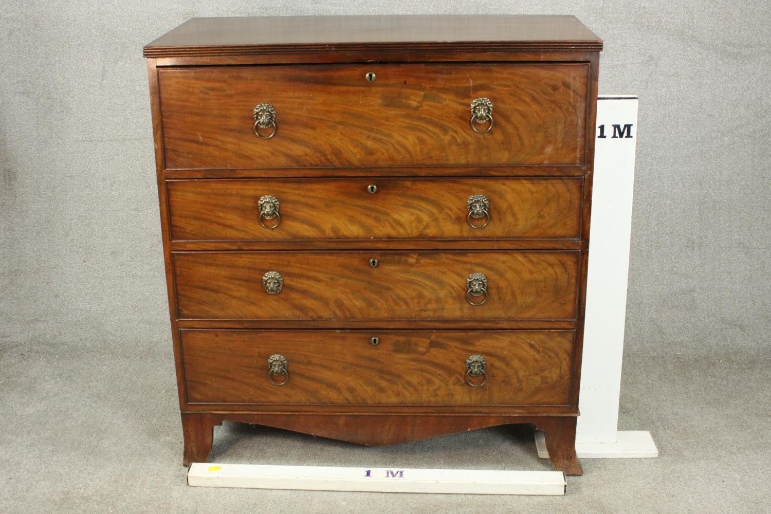 An early 19th century flame mahogany secretaire chest, with a secretaire drawer over three long - Image 2 of 11