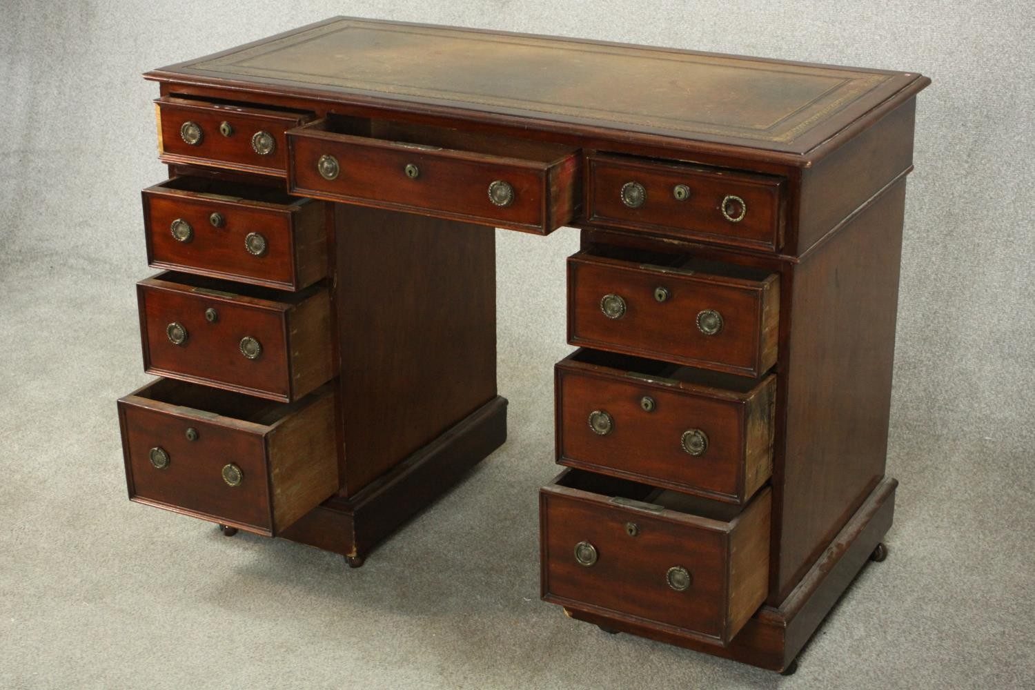 A small C.1900 mahogany pedestal desk, with a tooled green leather writing insert over an - Image 5 of 9