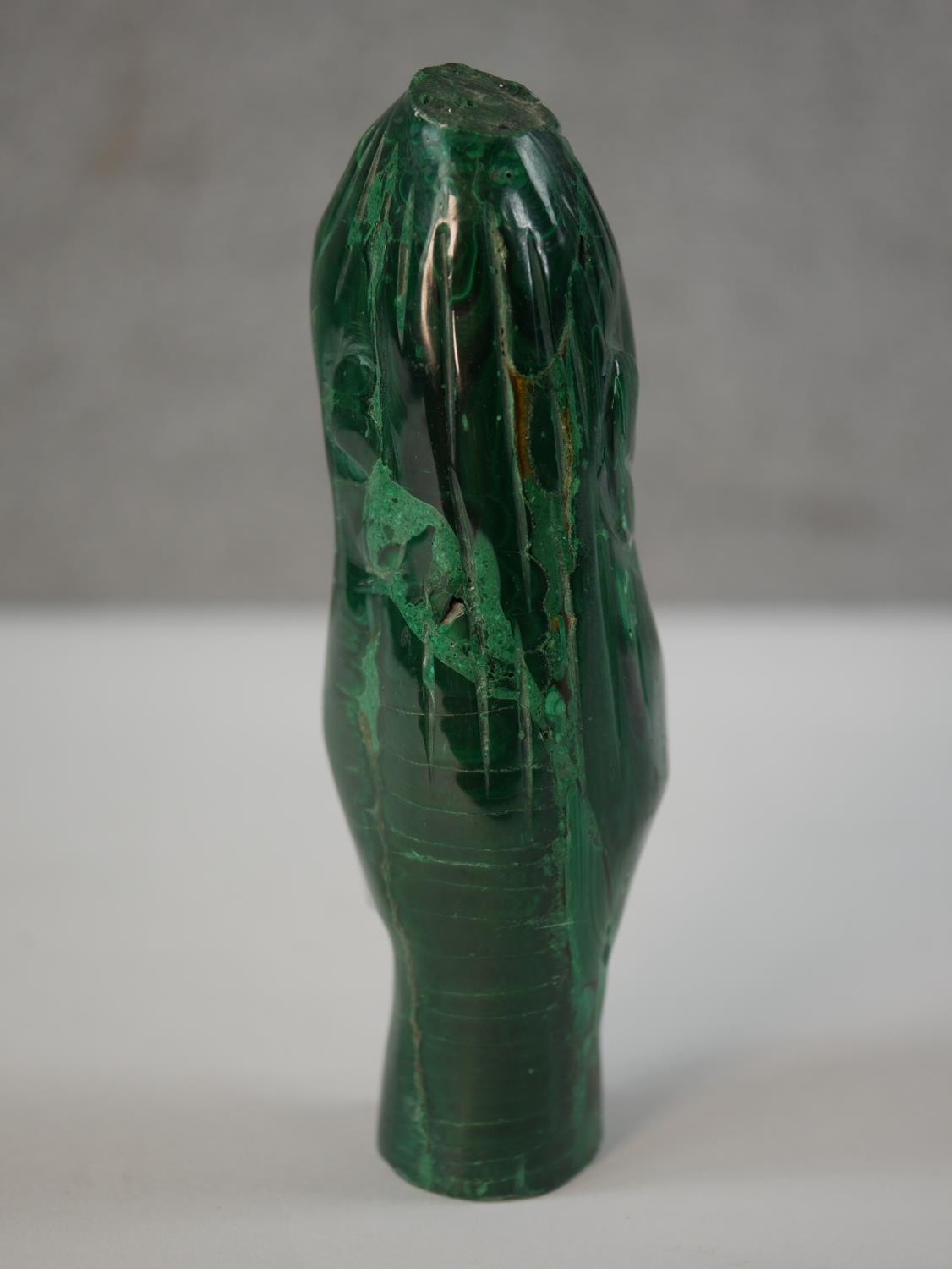 A carved malachite African tribal head. H.15cm - Image 3 of 5