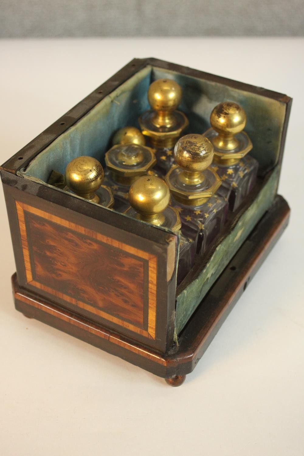 A 19th century six bottle perfume box, inlaid with burr wood panels, missing the front and lid, with - Image 8 of 9