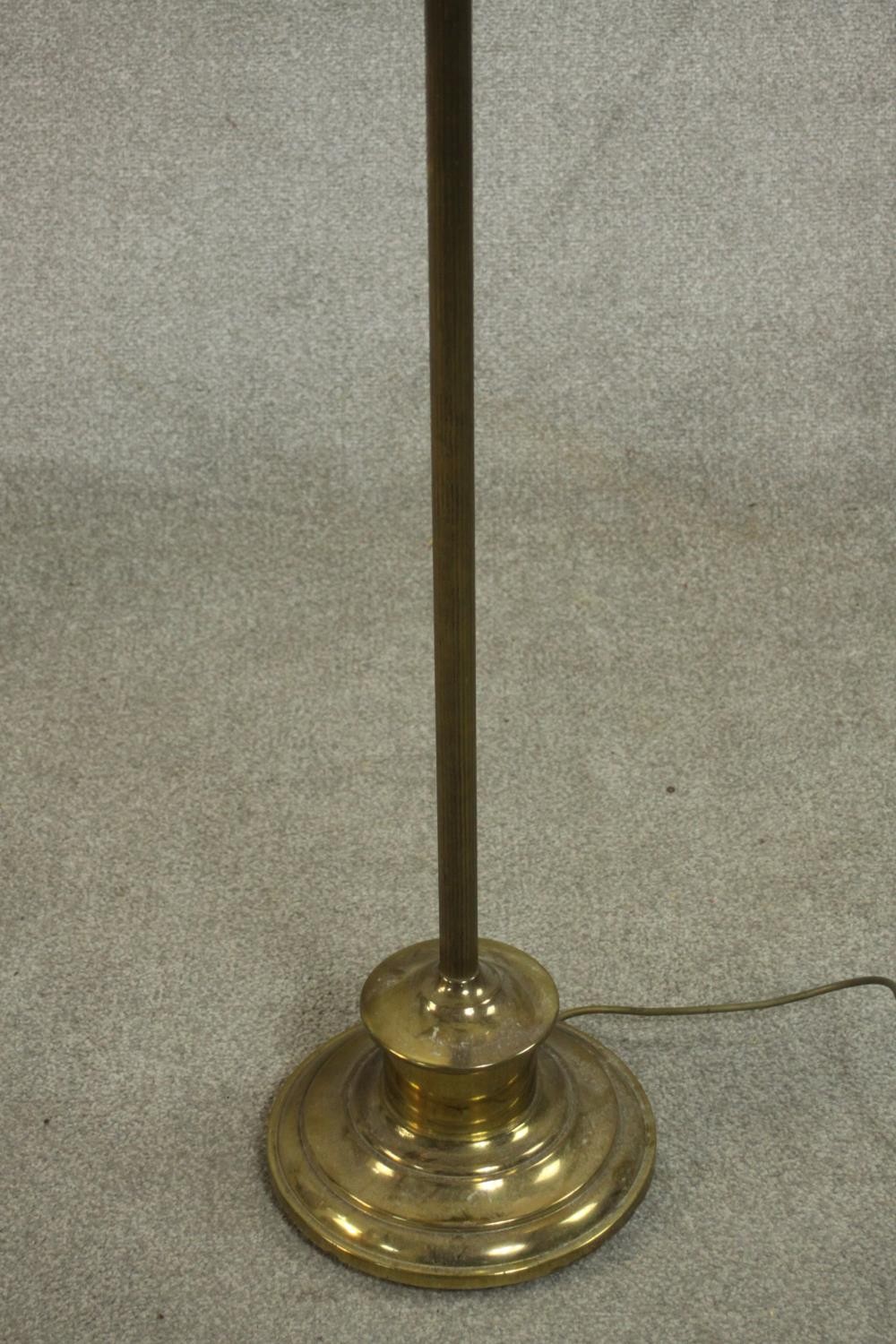 A 20th century standard lamp with a circular brass base and a white shade. H.147 Dia.59cm. - Image 3 of 4