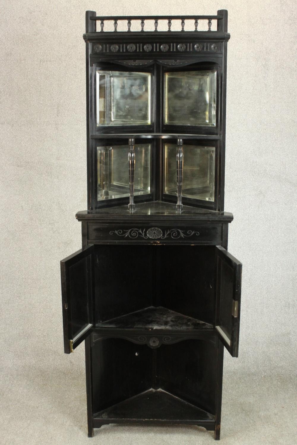 A Victorian Aesthetic movement ebonised corner cabinet with a gallery top over a shelf flanked by - Image 5 of 8