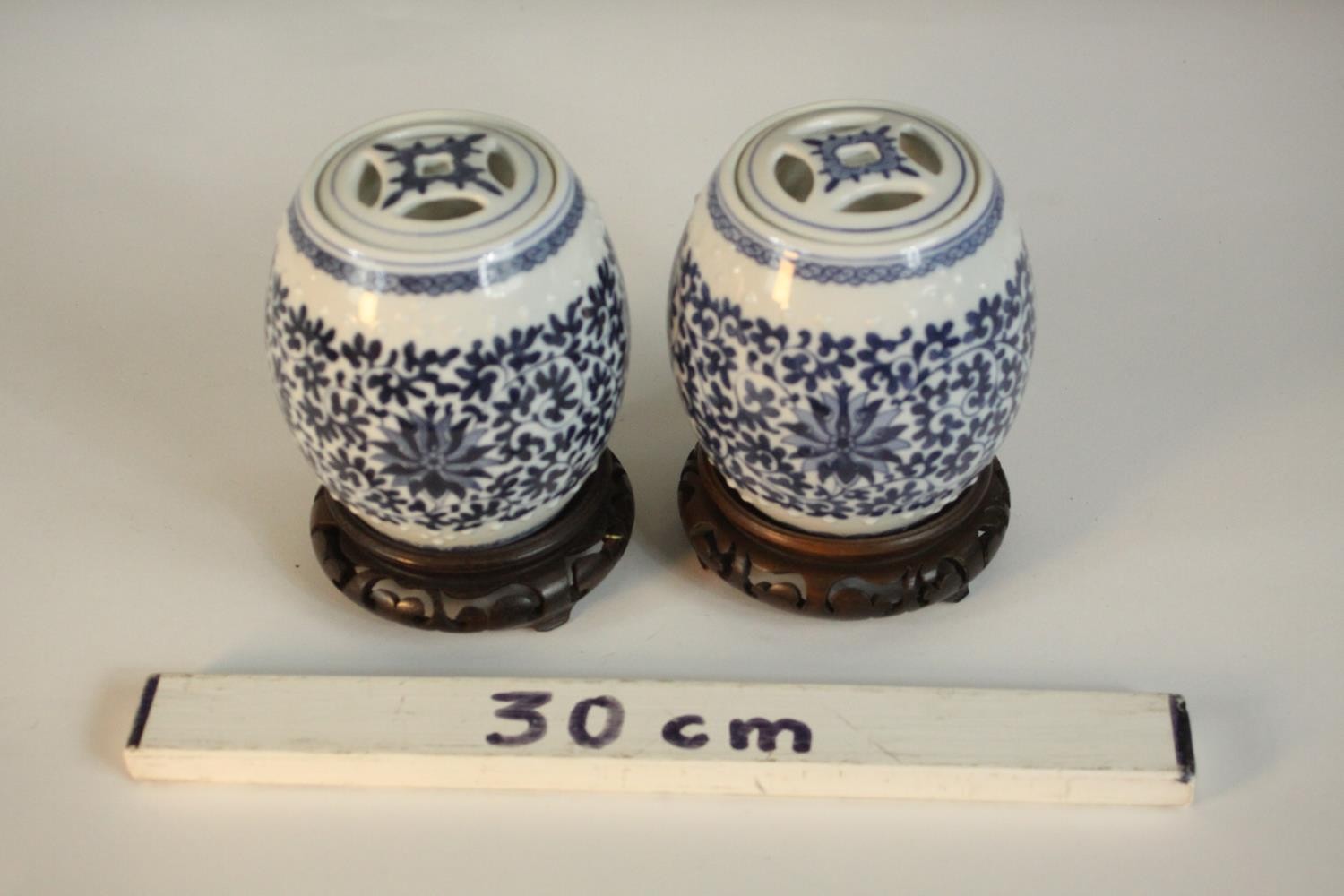 Two blue and white miniature porcelain lidded jars in the form of Chinese stools with stylised - Image 2 of 8