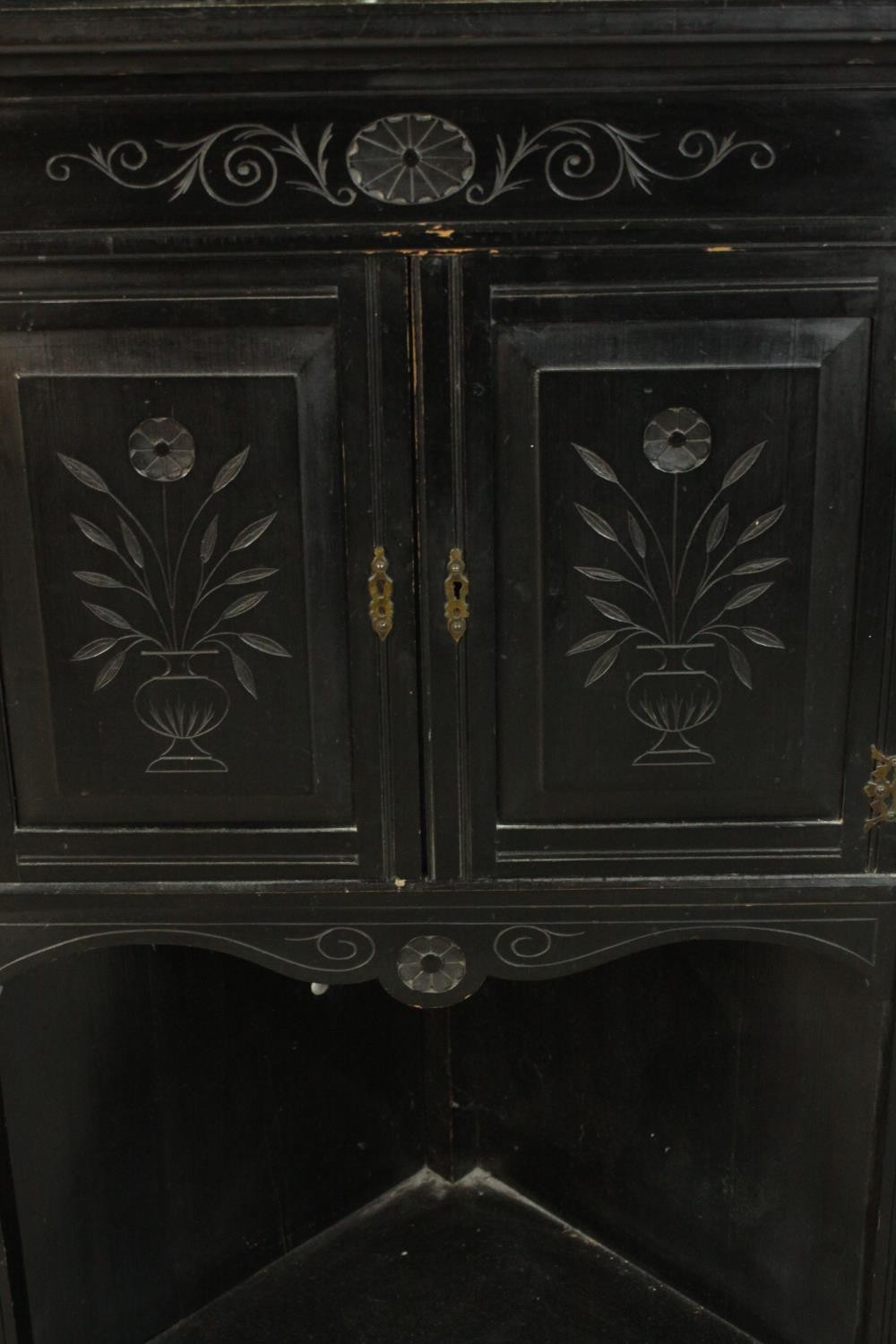 A Victorian Aesthetic movement ebonised corner cabinet with a gallery top over a shelf flanked by - Image 4 of 8