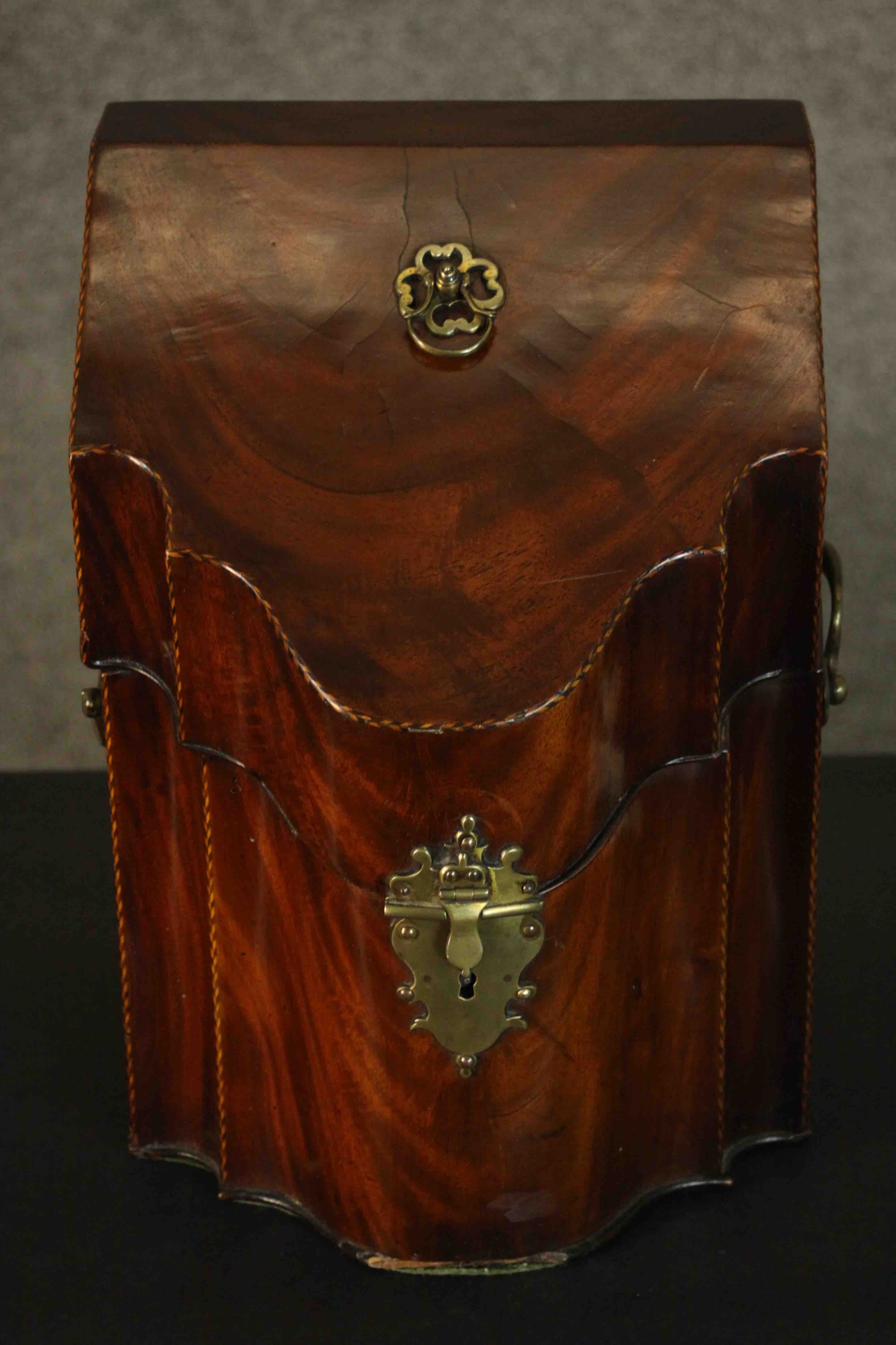 A converted 20th century Edwardian mahogany knife box, of typical form, herringbone inlay banding