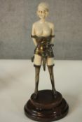 After Chiparus, an Art Deco style resin figure of the whip girl. H.32 W.14 D.10cm.