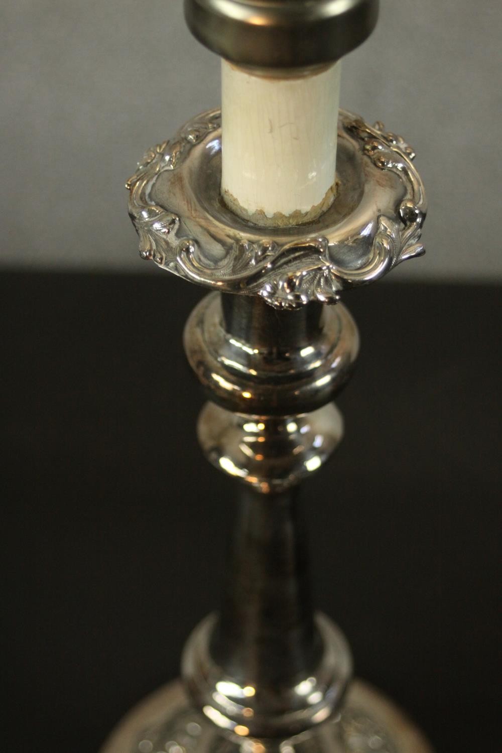 Two repousse silver plated candlesticks converted into table lamps. H.57 W.15 D.15cm. (largest) - Image 7 of 11