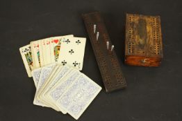 Two treen early 20th century cribbage sets one with vintage playing cards. H.5 W.11 D.8cm. (largest)