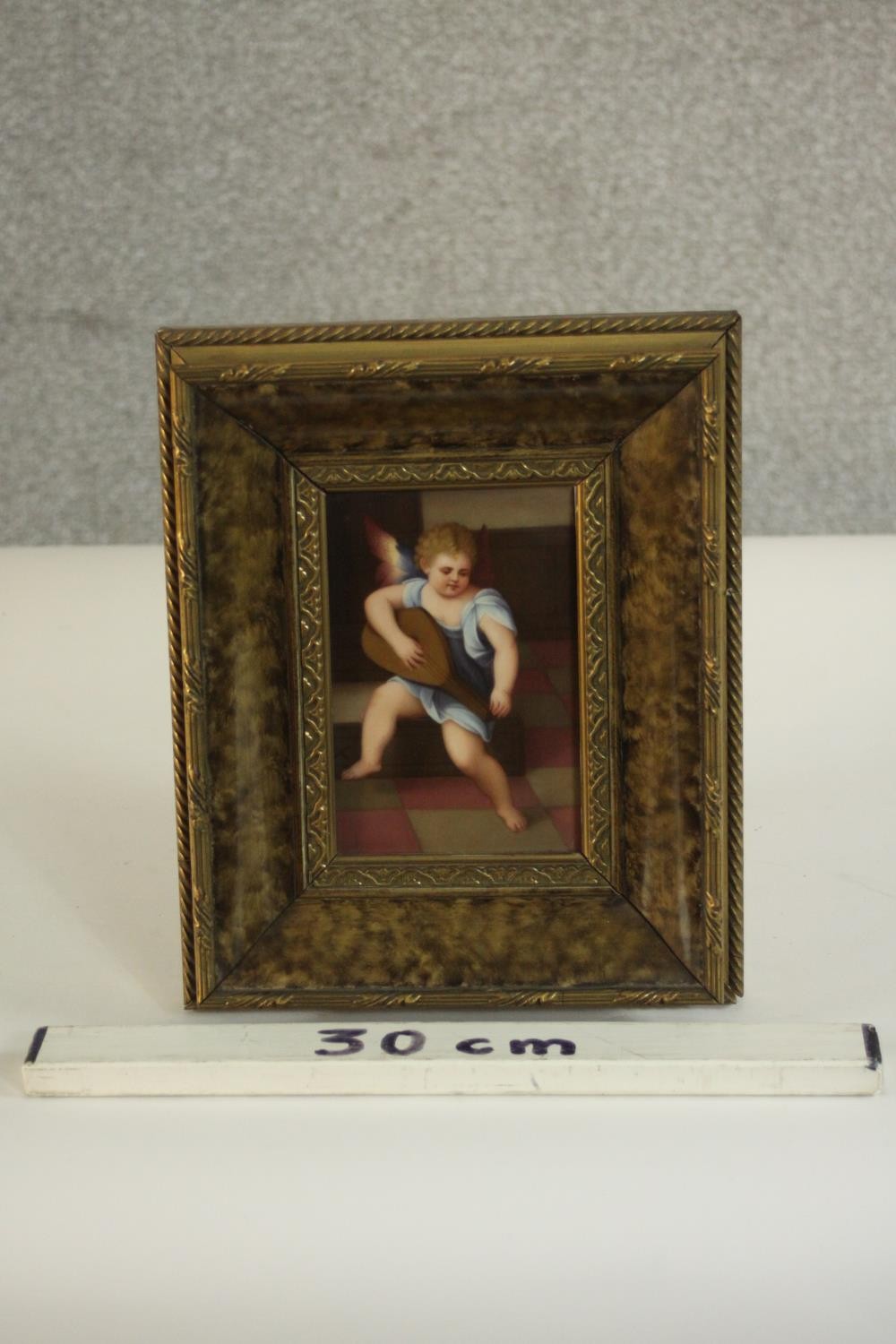 A framed painting on porcelain of an angel playing a lute, inscribed in pencil and stamped - Image 3 of 8