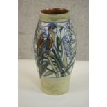 Harry Simeon for Royal Doulton, a stoneware vase, ovoid form, decorated with a band of tube lined