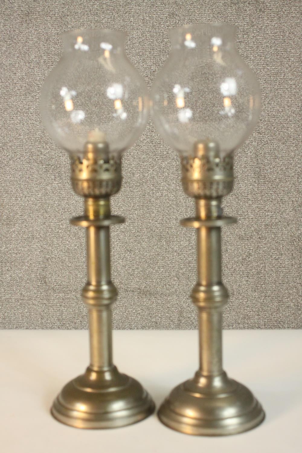 A pair of Victorian silver plated candlesticks, with glass storm shades, together with a converted - Image 7 of 8