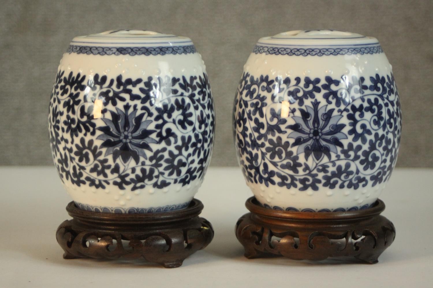 Two blue and white miniature porcelain lidded jars in the form of Chinese stools with stylised - Image 3 of 8