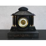 A Victorian slate marble mantle clock of architectural form, the enamelled chapter ring painted with