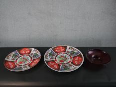 Two large transfer design Japanese chargers with sectioned floral design along with a vintage ruby