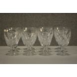 A set of twelve 19th century Waterford crystal wine glasses, with cut bowls and a single knop,
