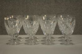 A set of twelve 19th century Waterford crystal wine glasses, with cut bowls and a single knop,