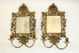 A pair of 19th century ormolu girandole wall mirrors, with a rectangular mirror plate, the frame