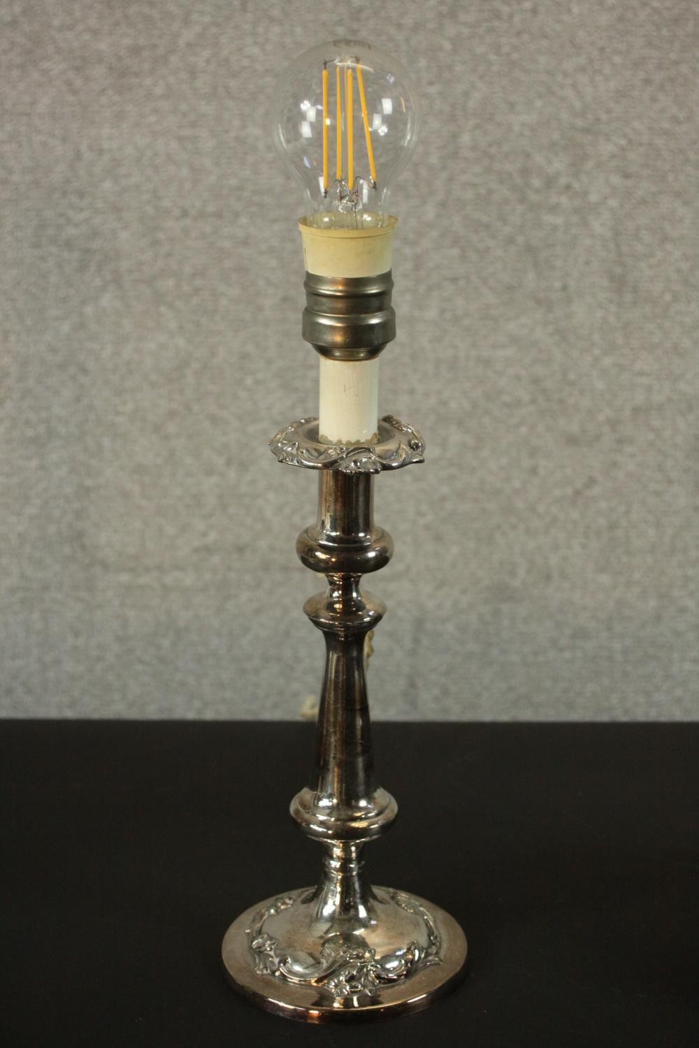 Two repousse silver plated candlesticks converted into table lamps. H.57 W.15 D.15cm. (largest) - Image 5 of 11
