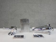 Three novelty vintage chrome table lighters, one modelled as a giant zippo lighter and two as