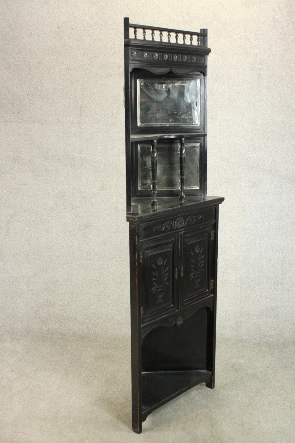 A Victorian Aesthetic movement ebonised corner cabinet with a gallery top over a shelf flanked by - Image 7 of 8