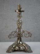 A 19th century silver plated repousse foliate design candelabra converted into a table lamp. The