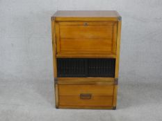 A late 20th century Chinese hardwood secretaire cabinet, with a fall front enclosing drawers and