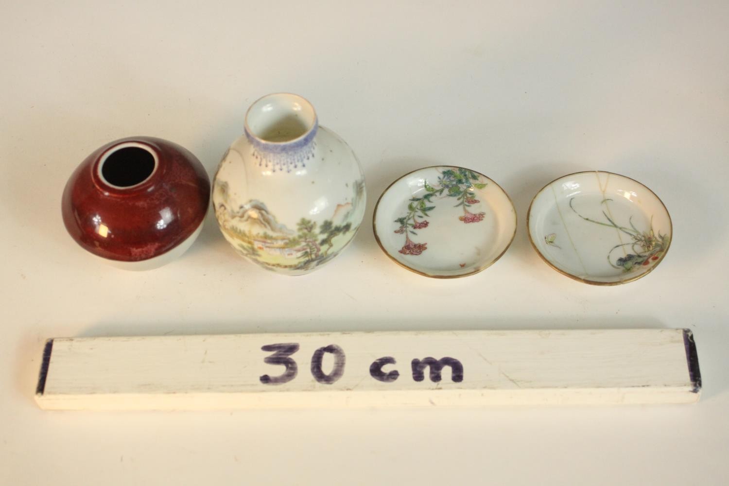 A collection of Asian ceramics and porcelain, including a sang de beuf glaze brush pot, two - Image 2 of 11