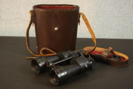 Ross London Stepmur 10x50 binoculars, numbered 30565, housed in a brown leather case. (lid loose)