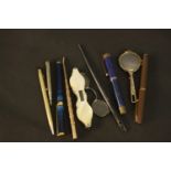 A collection of vintage and antique pens and other items. A mother of pearl cased pair of