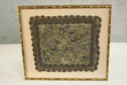 A framed and glazed 19th century Chinese silk embroidery with lucky bats, butterflies and stylised