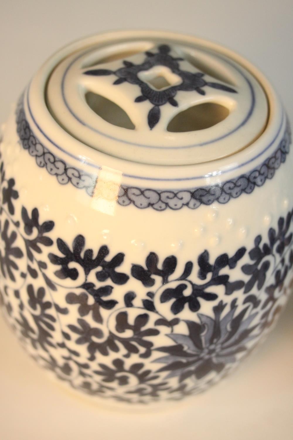 Two blue and white miniature porcelain lidded jars in the form of Chinese stools with stylised - Image 7 of 8