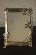 A WMF Art Nouveau style electro plated `Echo` strut mirror, the rectangular frame cast with