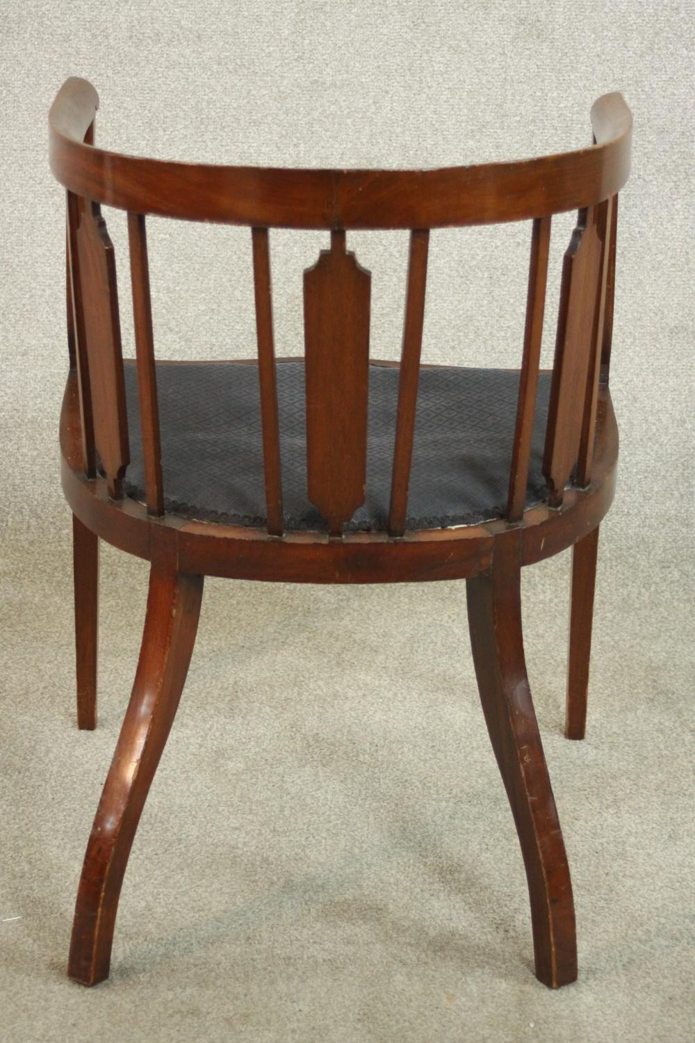 An Edwardian mahogany and inlaid tub chair, the serpentine fronted seat upholstered in dark grey - Image 4 of 7