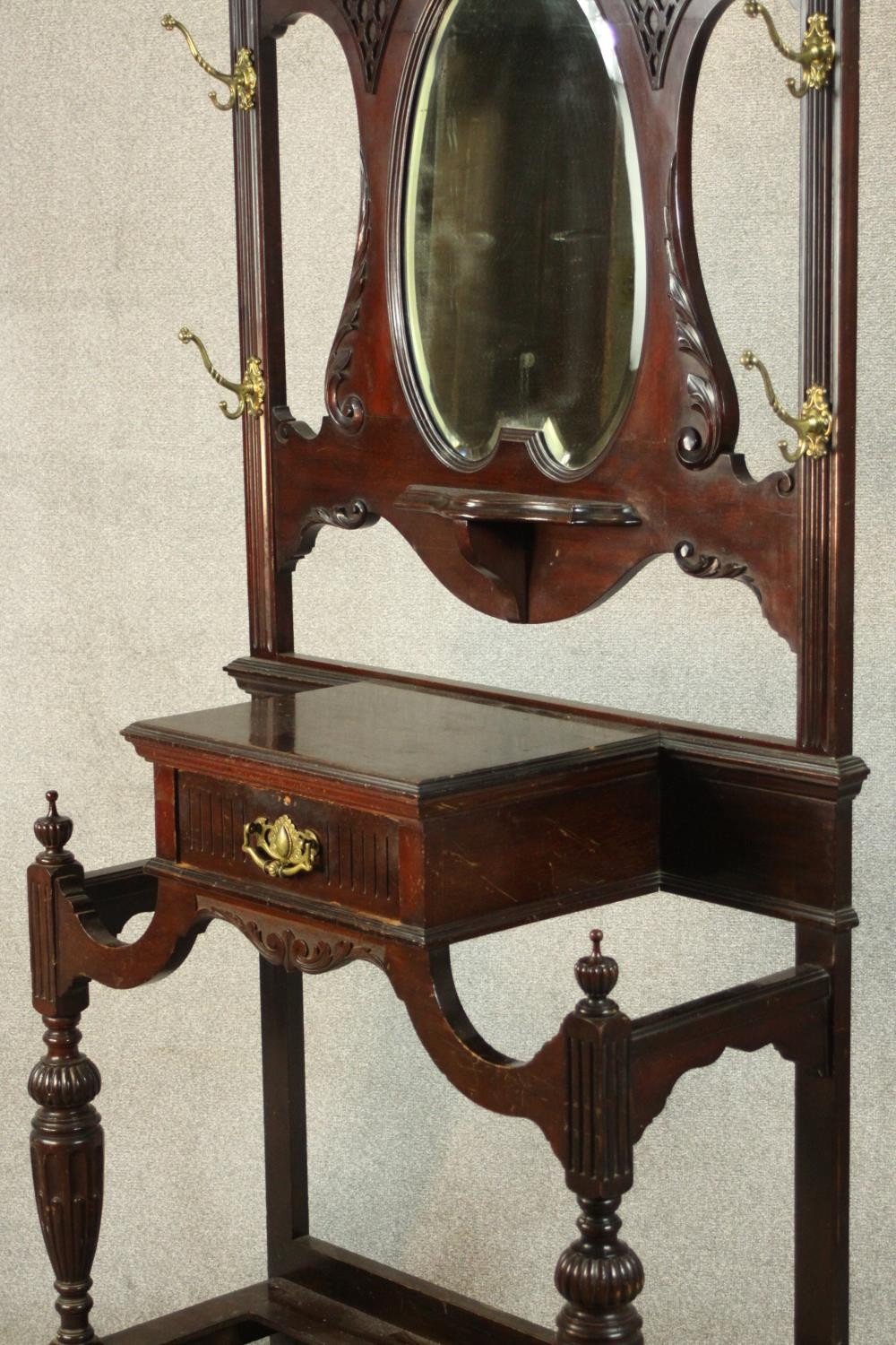 A late Victorian Chippendale style walnut hall stand, the scrolling pediment with blind fretwork - Image 11 of 11