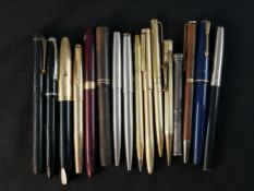 A collection of sixteen vintage and antique fountain pens, ballpoint pens and propelling pecils.