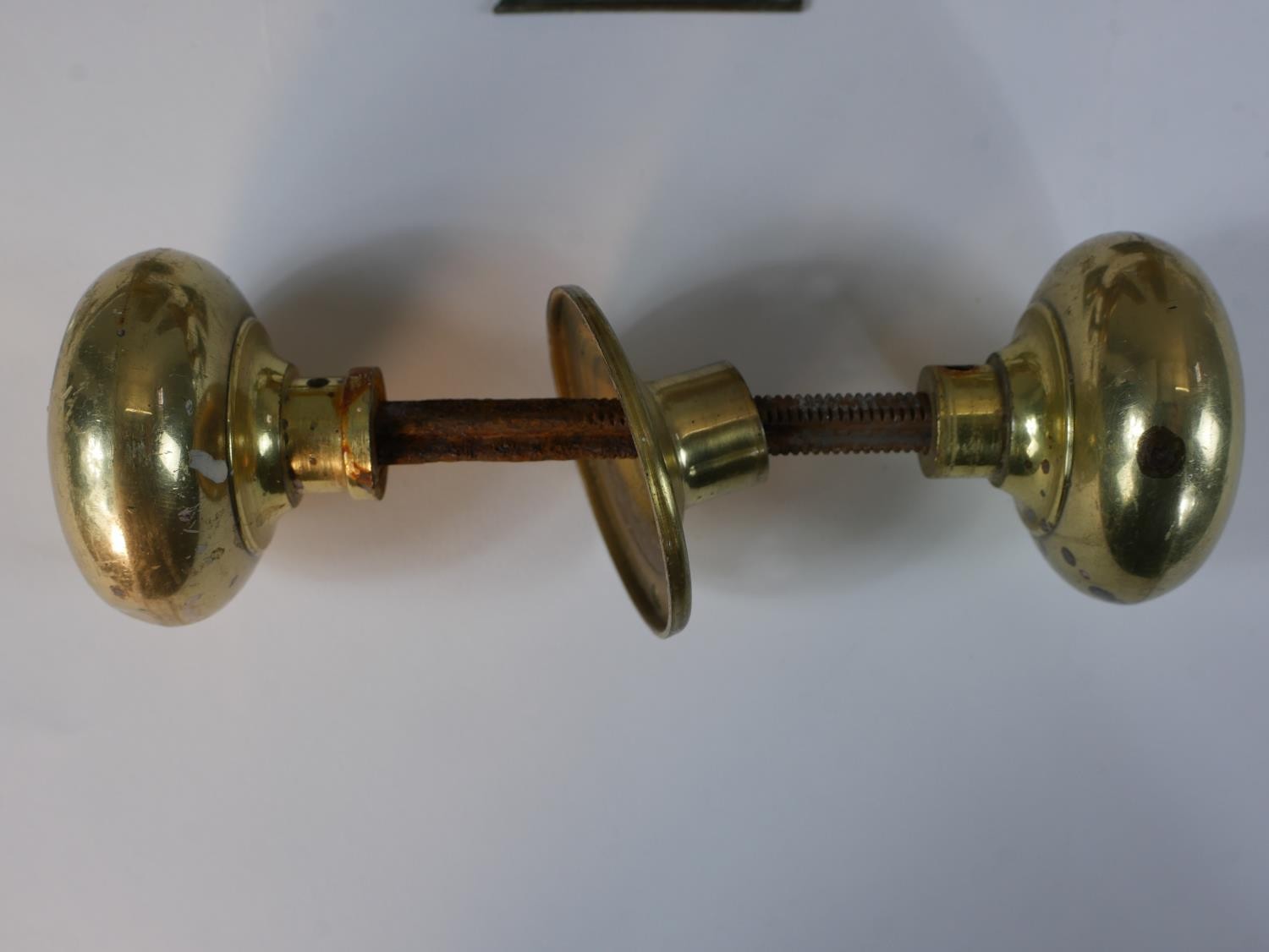 A collection of early 20th century brass and copper door decorations including a number of door - Image 5 of 7