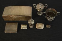 A collection of silver items, including a cedar lined engine decorated cigarette box, a Georgian