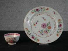 An 18th century Chinese export Famille Rose plate with floral design along with a matching lotus